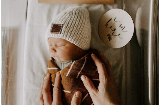 newborn in bassinet